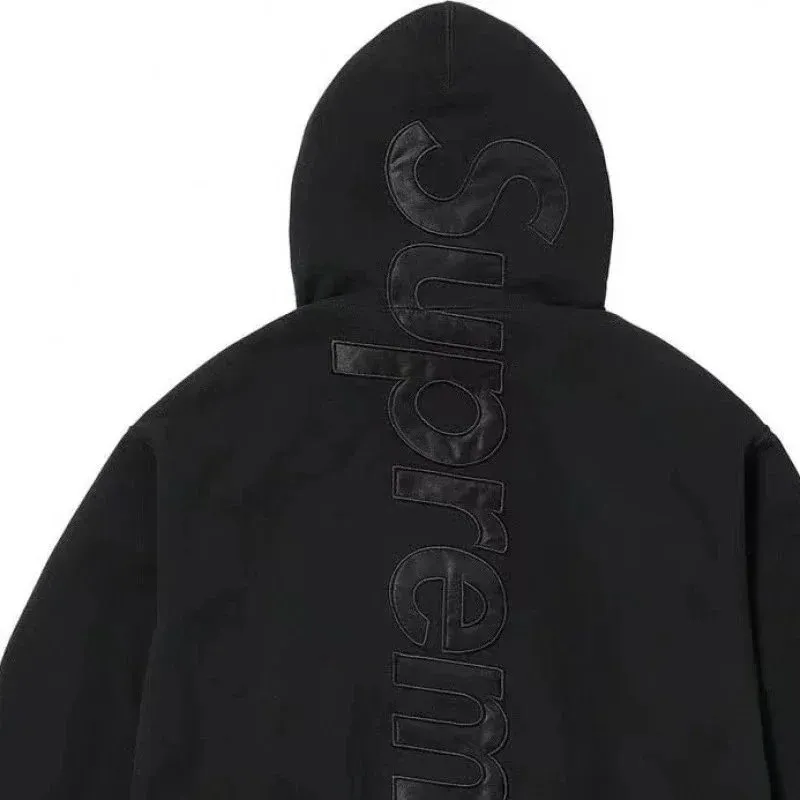 Black letters (large letters on the back)