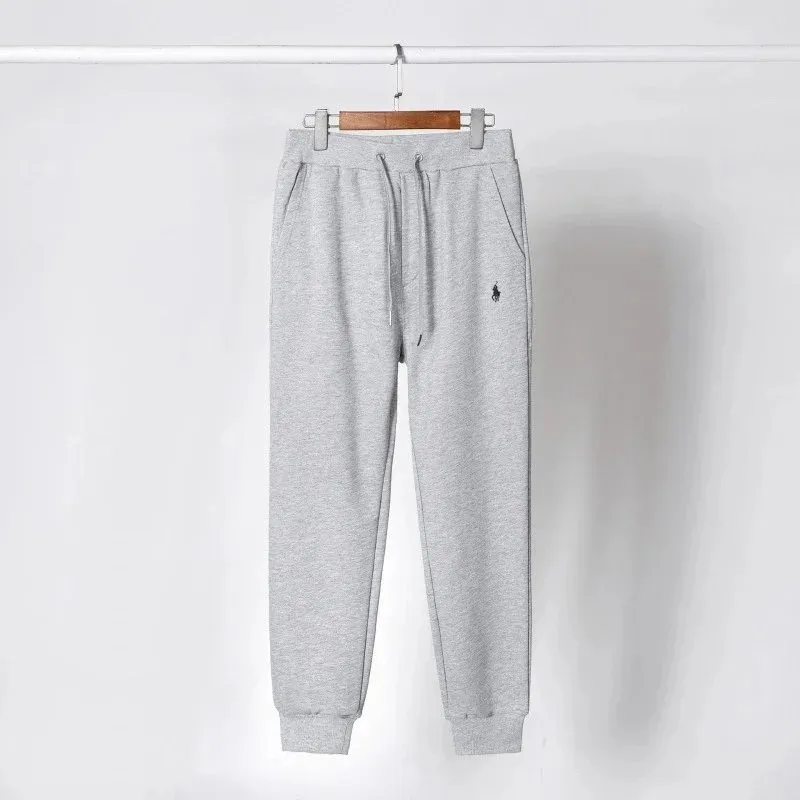 Grey pants with black label